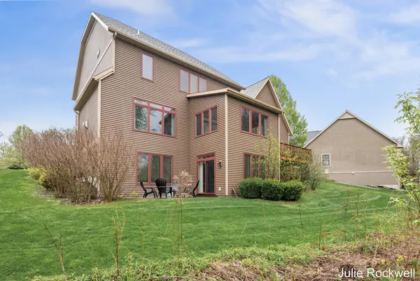 $990,000 | 4985 West Village Court Southeast, Ada, MI 49301