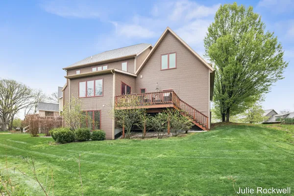 $990,000 | 4985 West Village Court Southeast, Ada, MI 49301