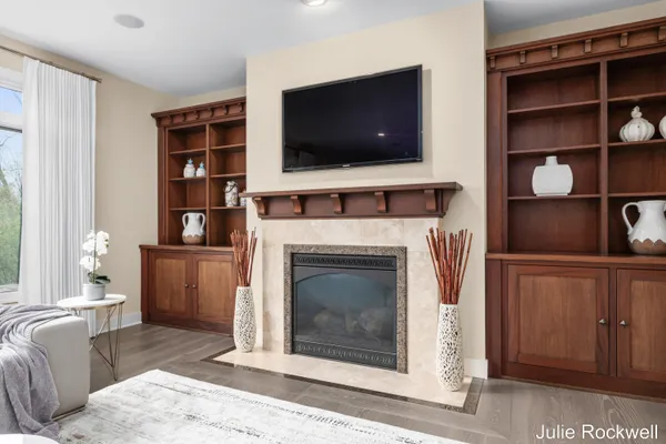 $990,000 | 4985 West Village Court Southeast, Ada, MI 49301