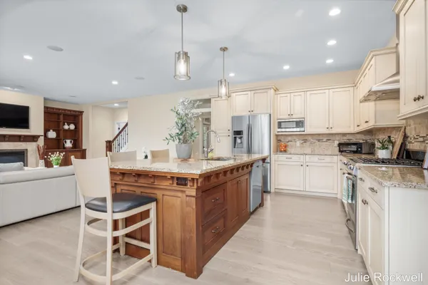 $990,000 | 4985 West Village Court Southeast, Ada, MI 49301