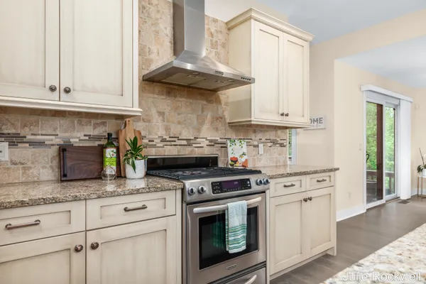 $990,000 | 4985 West Village Court Southeast, Ada, MI 49301