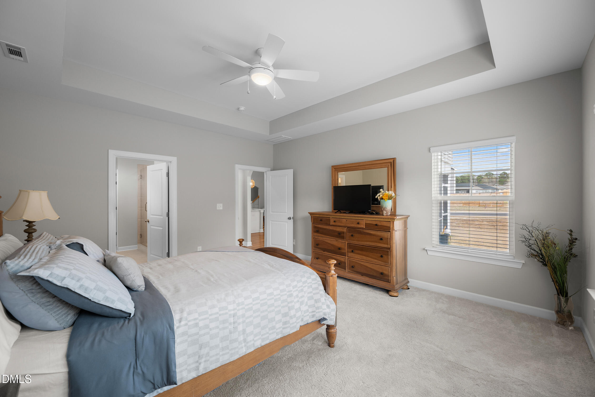 411 North Maple Walk Garner, NC 27529 - Photo 17 of 41 a bedroom with a bed and furniture
