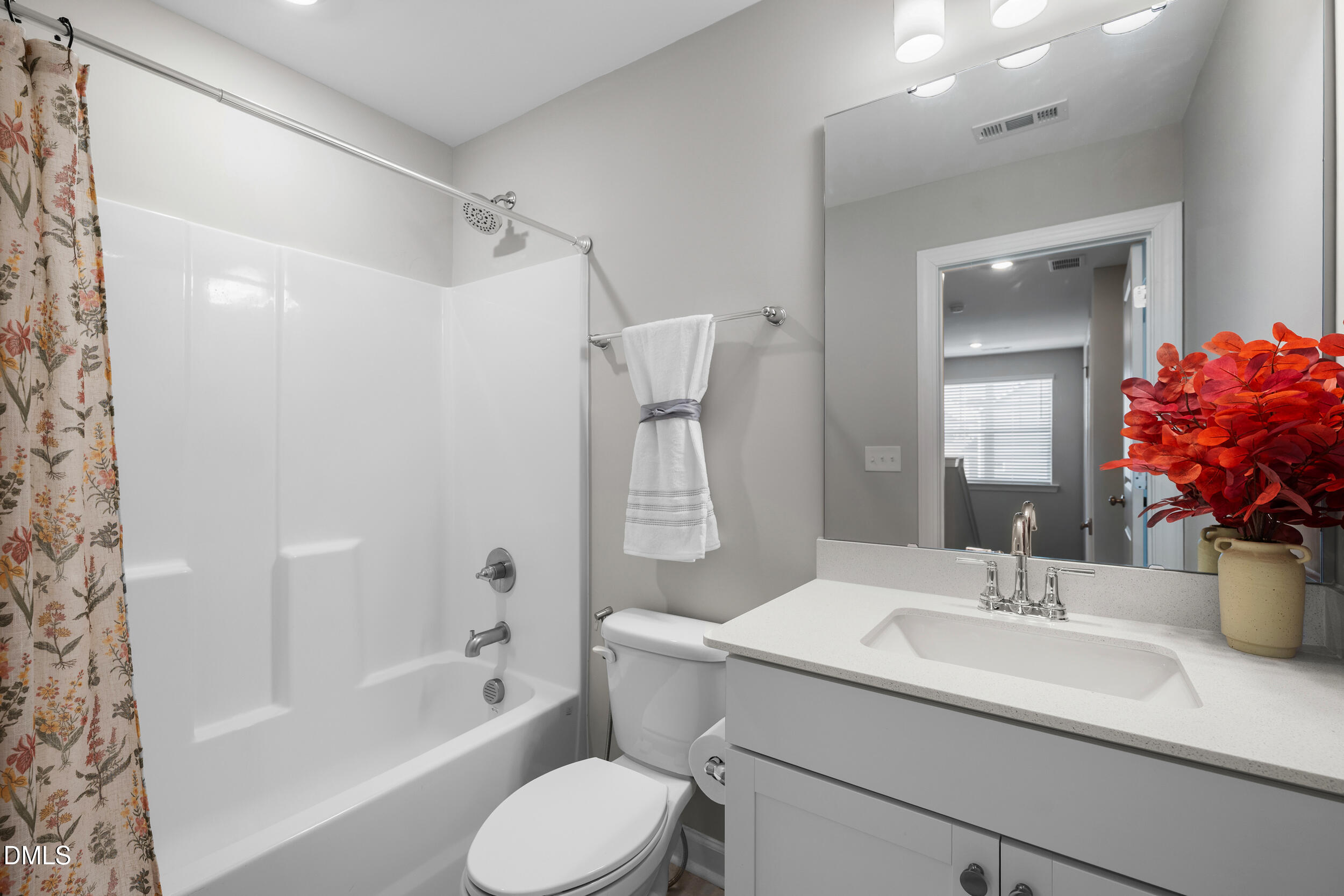 411 North Maple Walk Garner, NC 27529 - Photo 24 of 41 a bathroom with a granite countertop sink toilet and shower