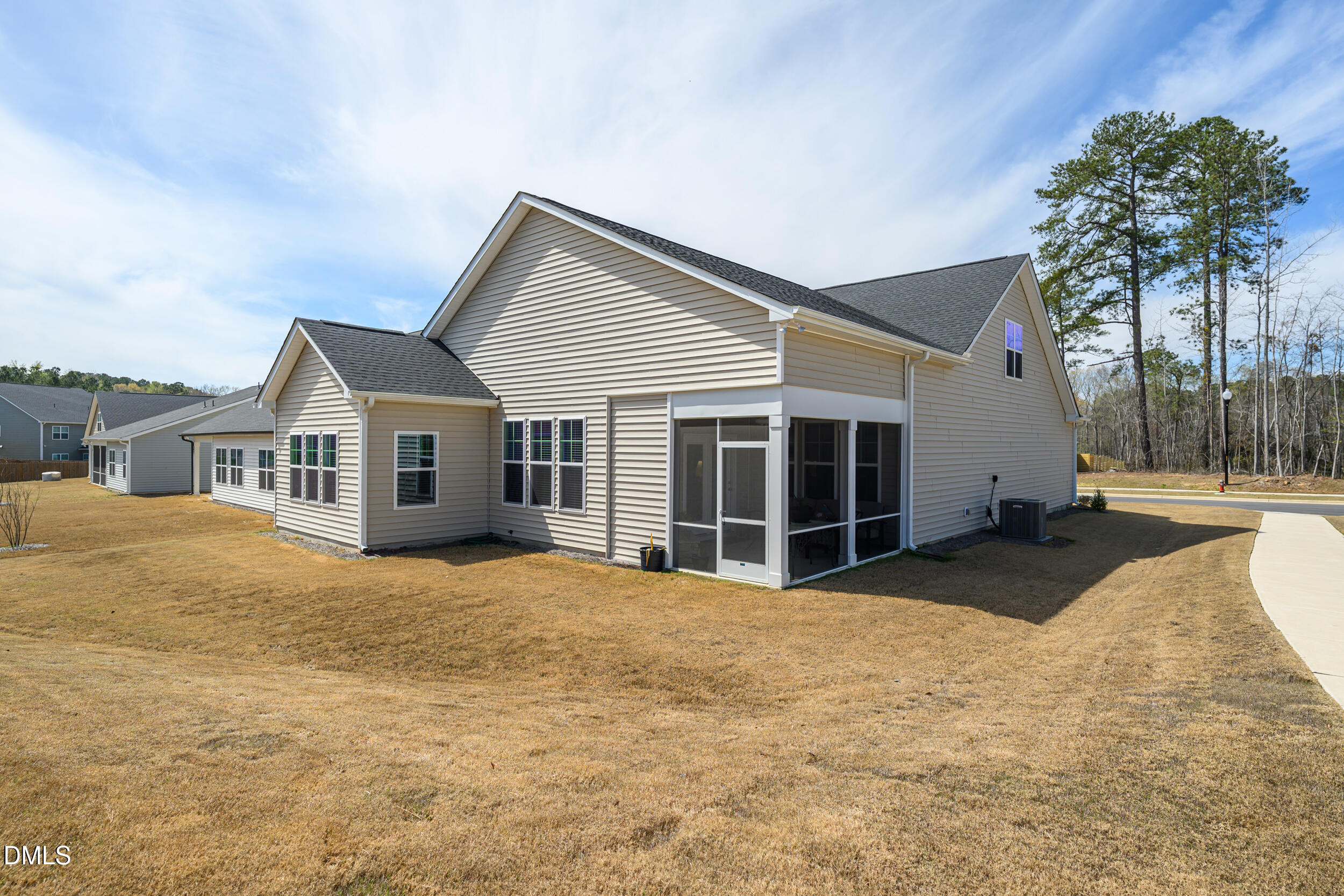 411 North Maple Walk Garner, NC 27529 - Photo 26 of 41 a view of a house with a yard and potted plants
