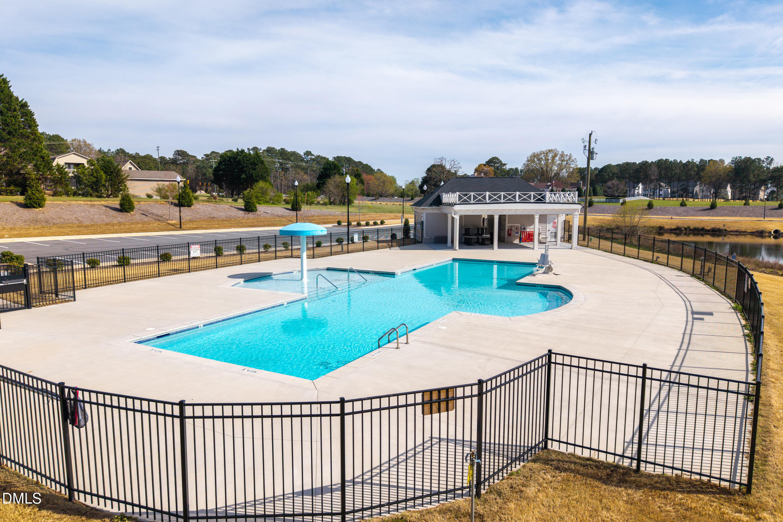 411 North Maple Walk Garner, NC 27529 - Photo 32 of 41 a view of a swimming pool with a terrace