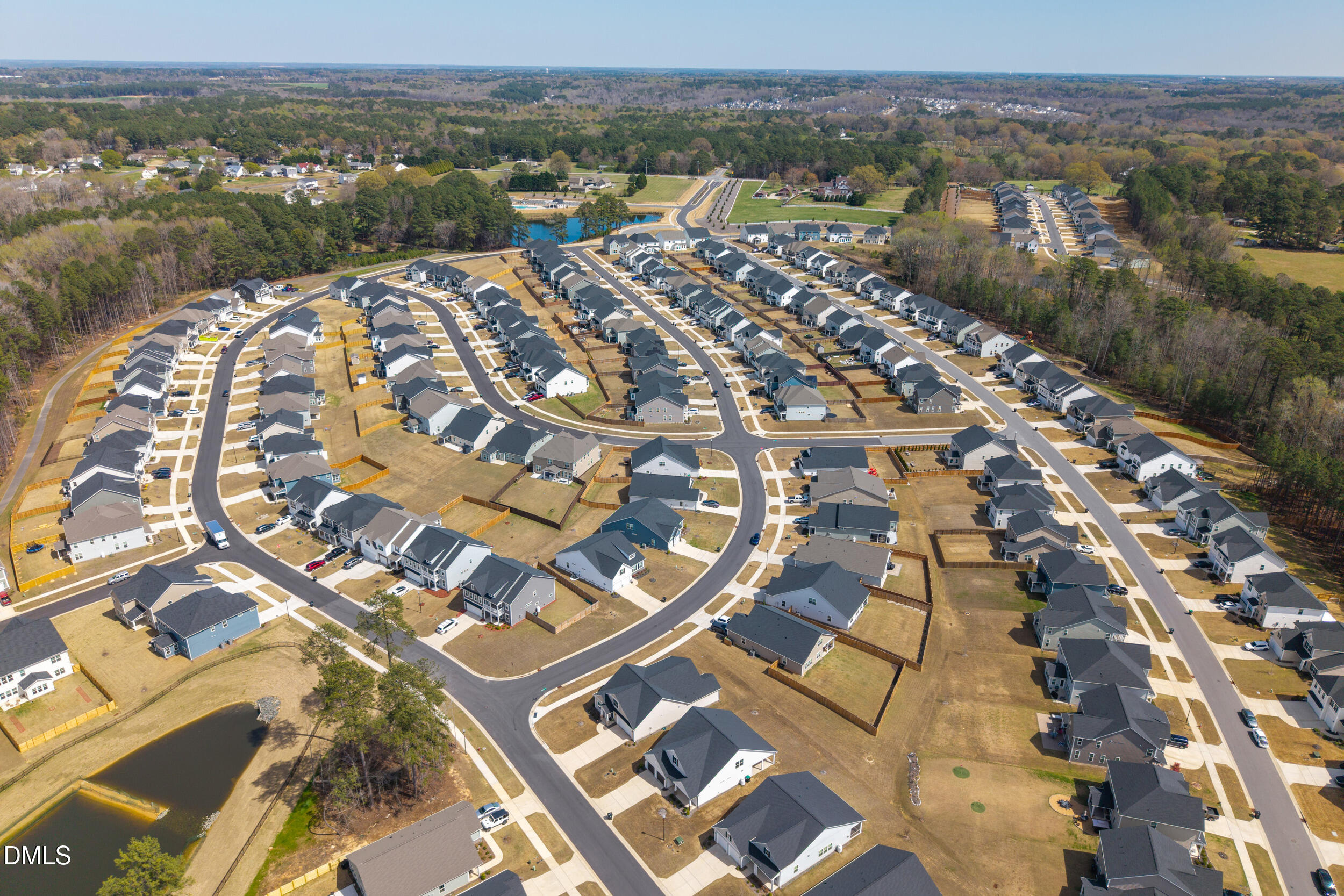 411 North Maple Walk Garner, NC 27529 - Photo 37 of 41 an aerial view of residential building with parking space