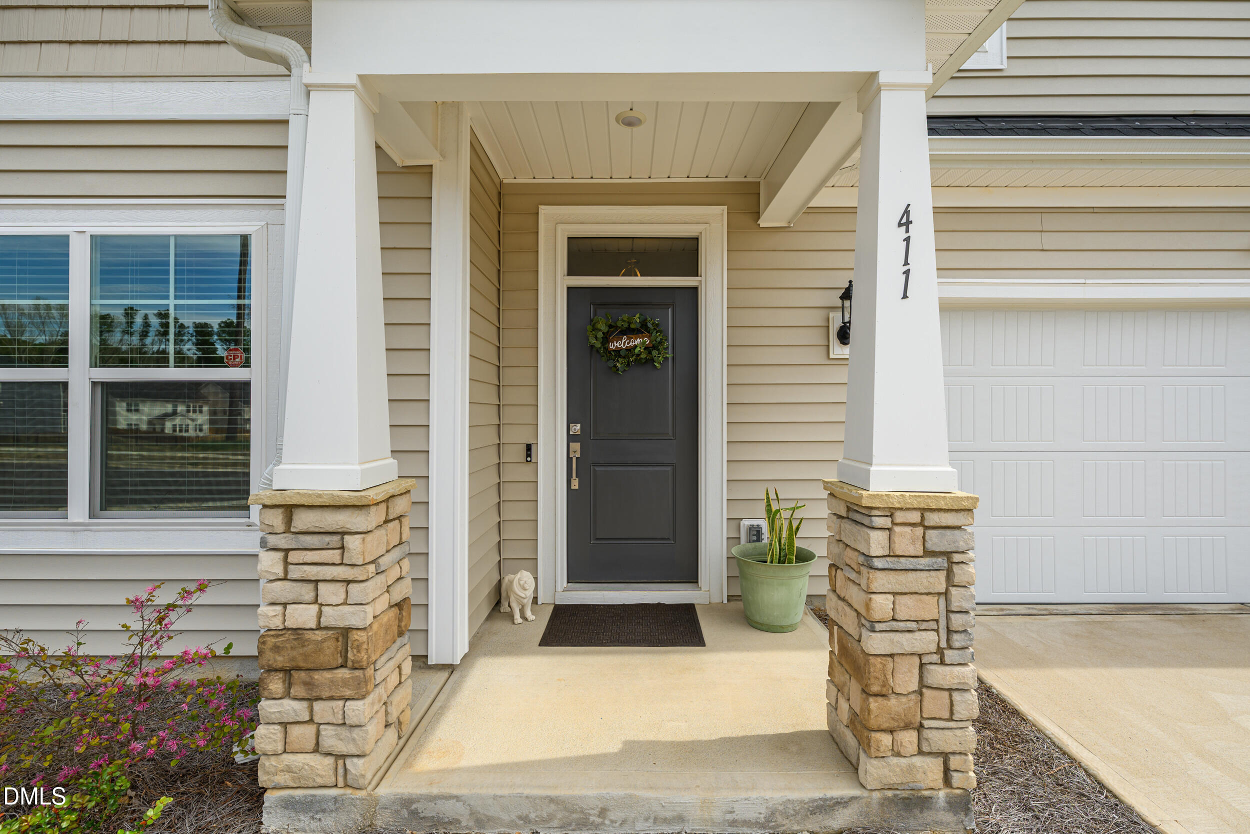 411 North Maple Walk Garner, NC 27529 - Photo 6 of 41 a view of house with outdoor space