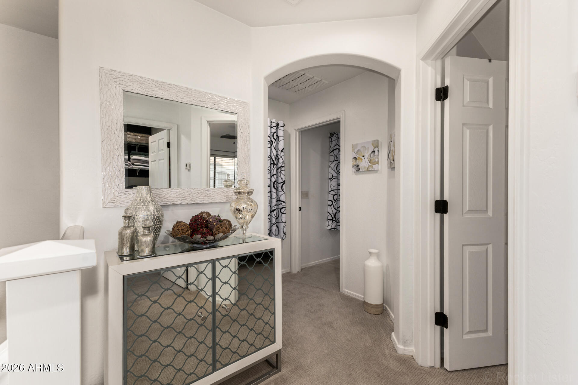 4676 East Redfield Road Gilbert, AZ 85234 - Photo 12 of 32 a bathroom with a sink a toilet and mirror