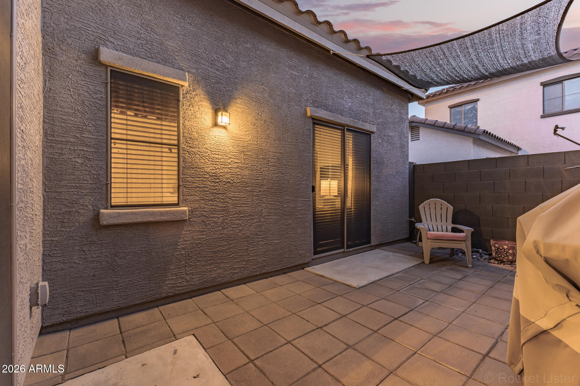 4676 East Redfield Road Gilbert, AZ 85234 - Photo 22 of 32 a front view of a house with chairs