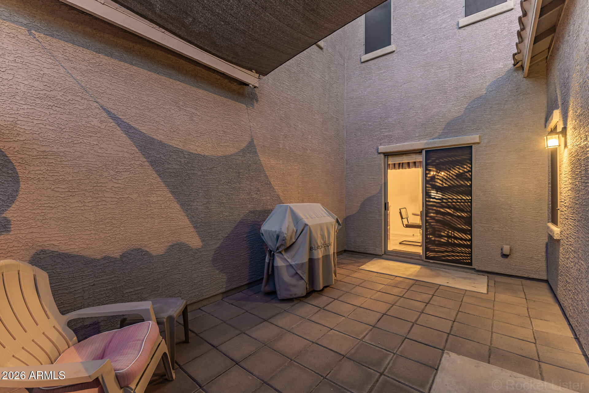 4676 East Redfield Road Gilbert, AZ 85234 - Photo 23 of 32 a view of a bedroom with furniture and natural light