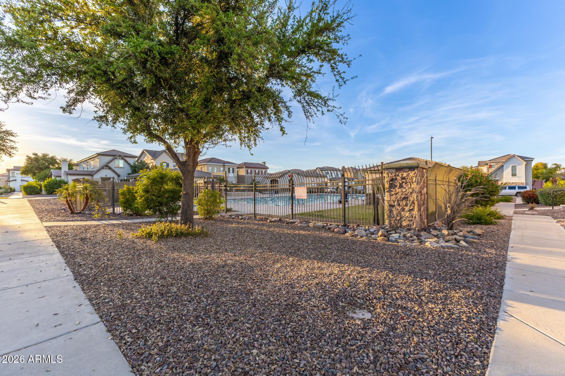 4676 East Redfield Road Gilbert, AZ 85234 - Photo 28 of 32 a view of a street with a houses