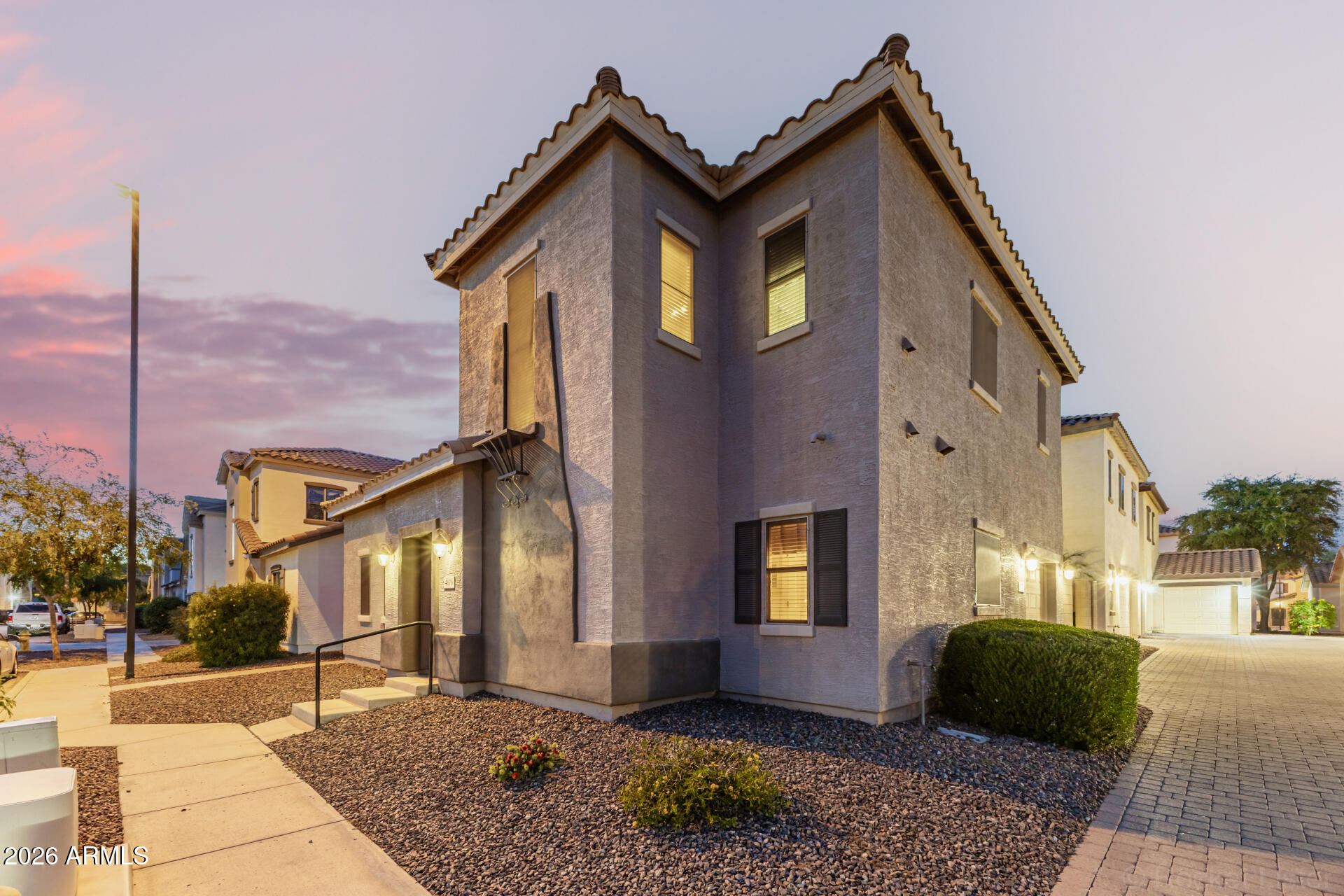 4676 East Redfield Road Gilbert, AZ 85234 - Photo 31 of 32 a front view of a house with a yard