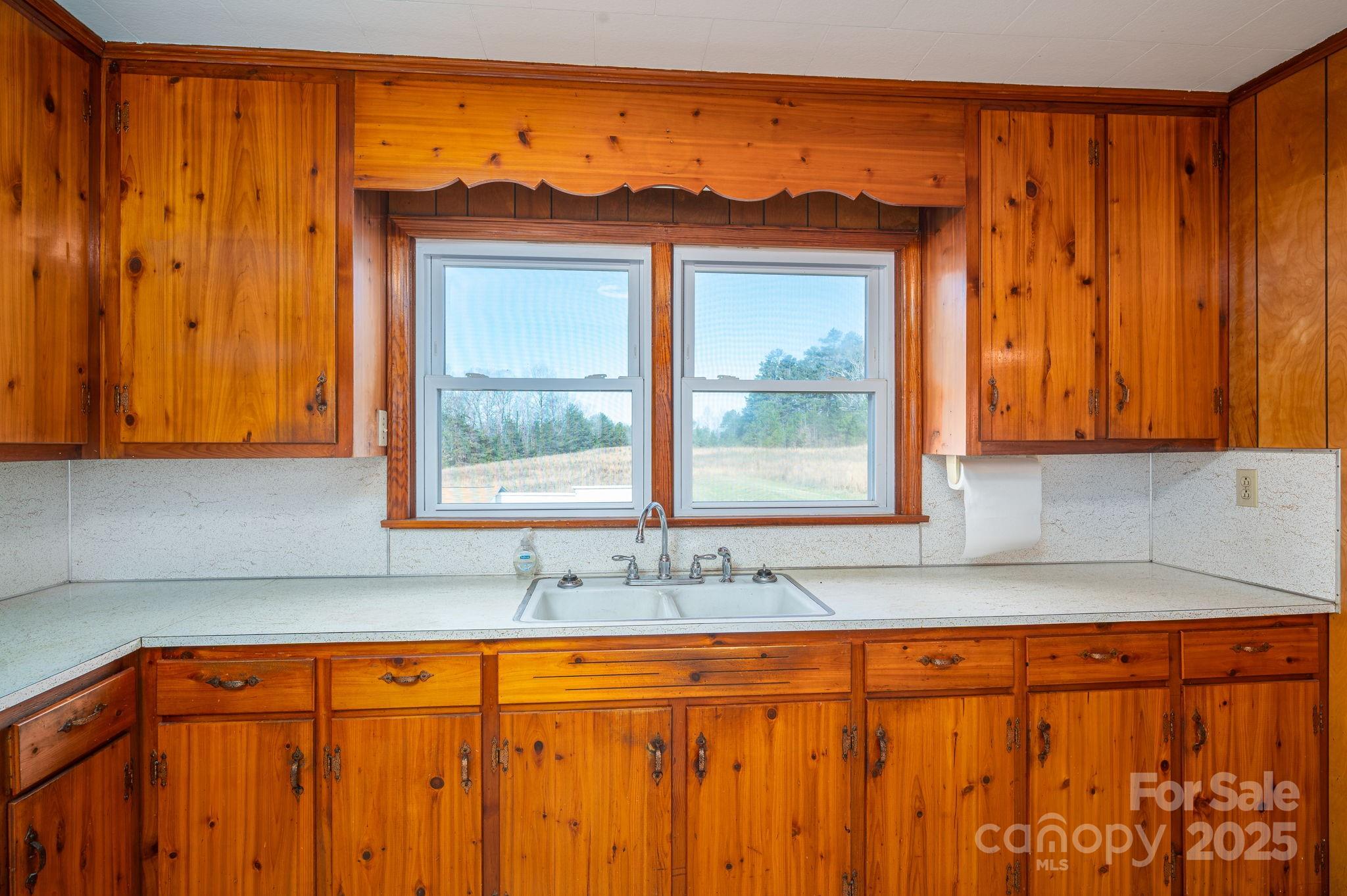 897 Calloway Road Lincolnton, NC 28092 - Photo 15 of 40 a view of a sink and a window