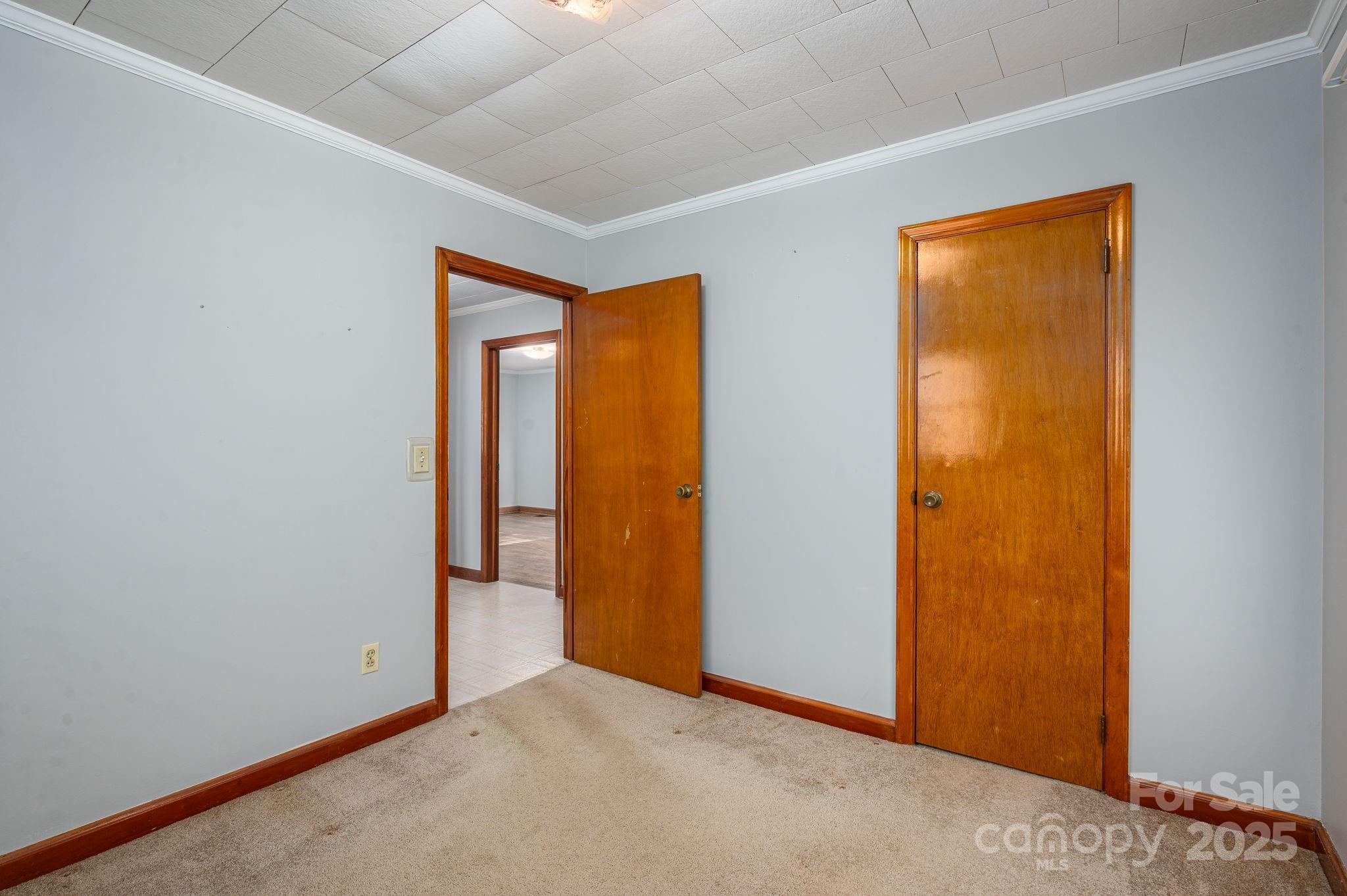 897 Calloway Road Lincolnton, NC 28092 - Photo 25 of 40 a view of an empty room with closet and a window