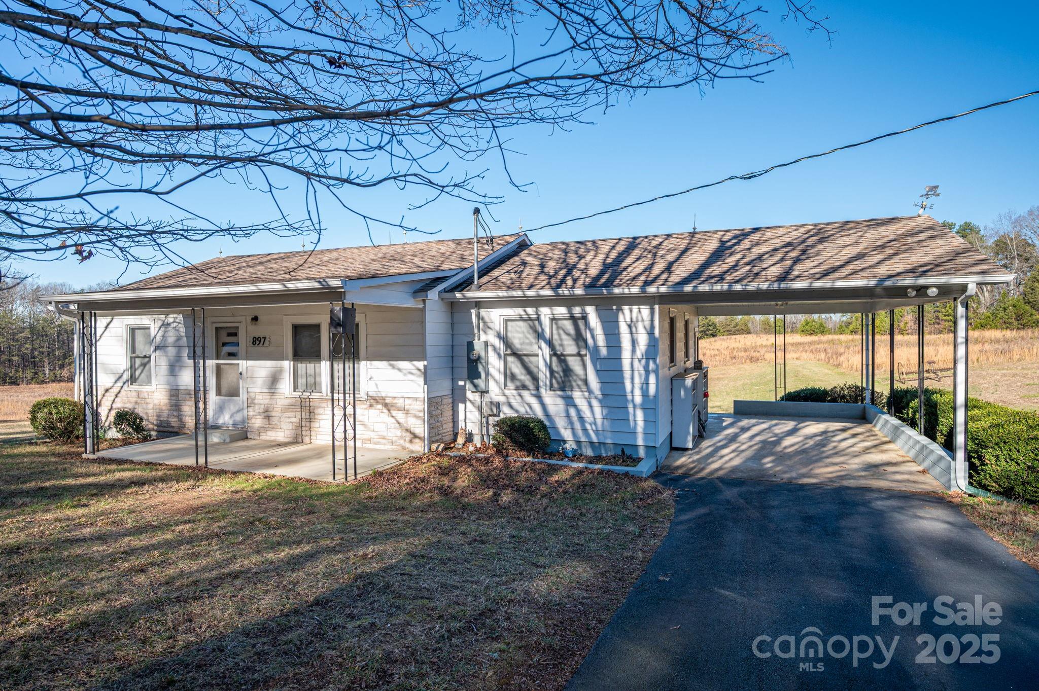897 Calloway Road Lincolnton, NC 28092 - Photo 8 of 40 a view of a house with a patio