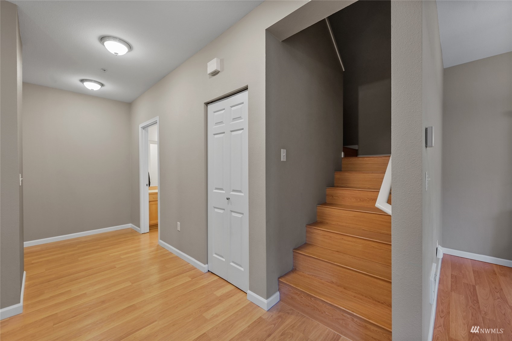 14335 Simonds Road Northeast, Unit A302 Kirkland, WA 98034 - Photo 12 of 25 a view of entryway with wooden floor