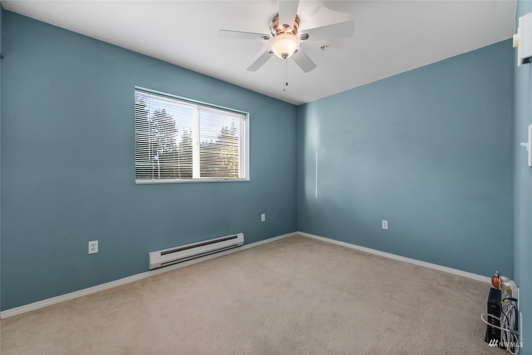 14335 Simonds Road Northeast, Unit A302 Kirkland, WA 98034 - Photo 16 of 25 an empty room with a window
