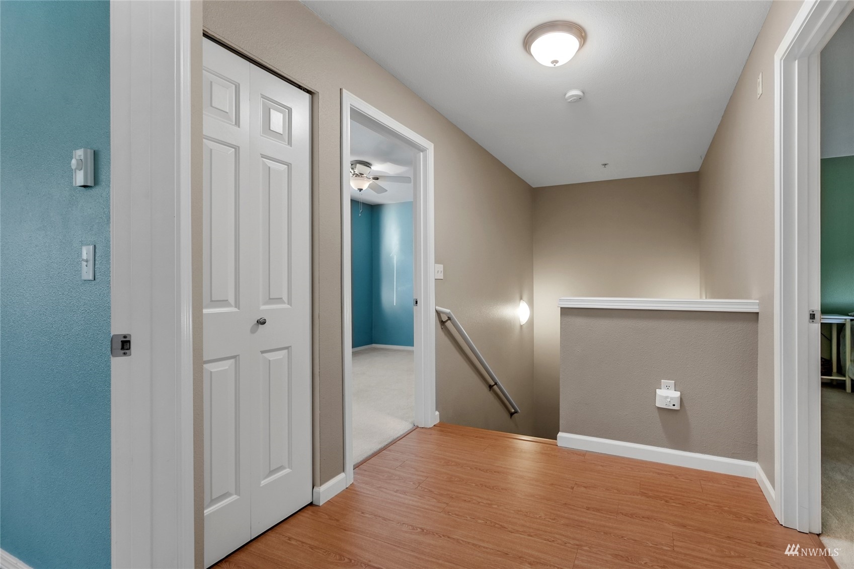 14335 Simonds Road Northeast, Unit A302 Kirkland, WA 98034 - Photo 19 of 25 an empty room with wooden floor and entryway