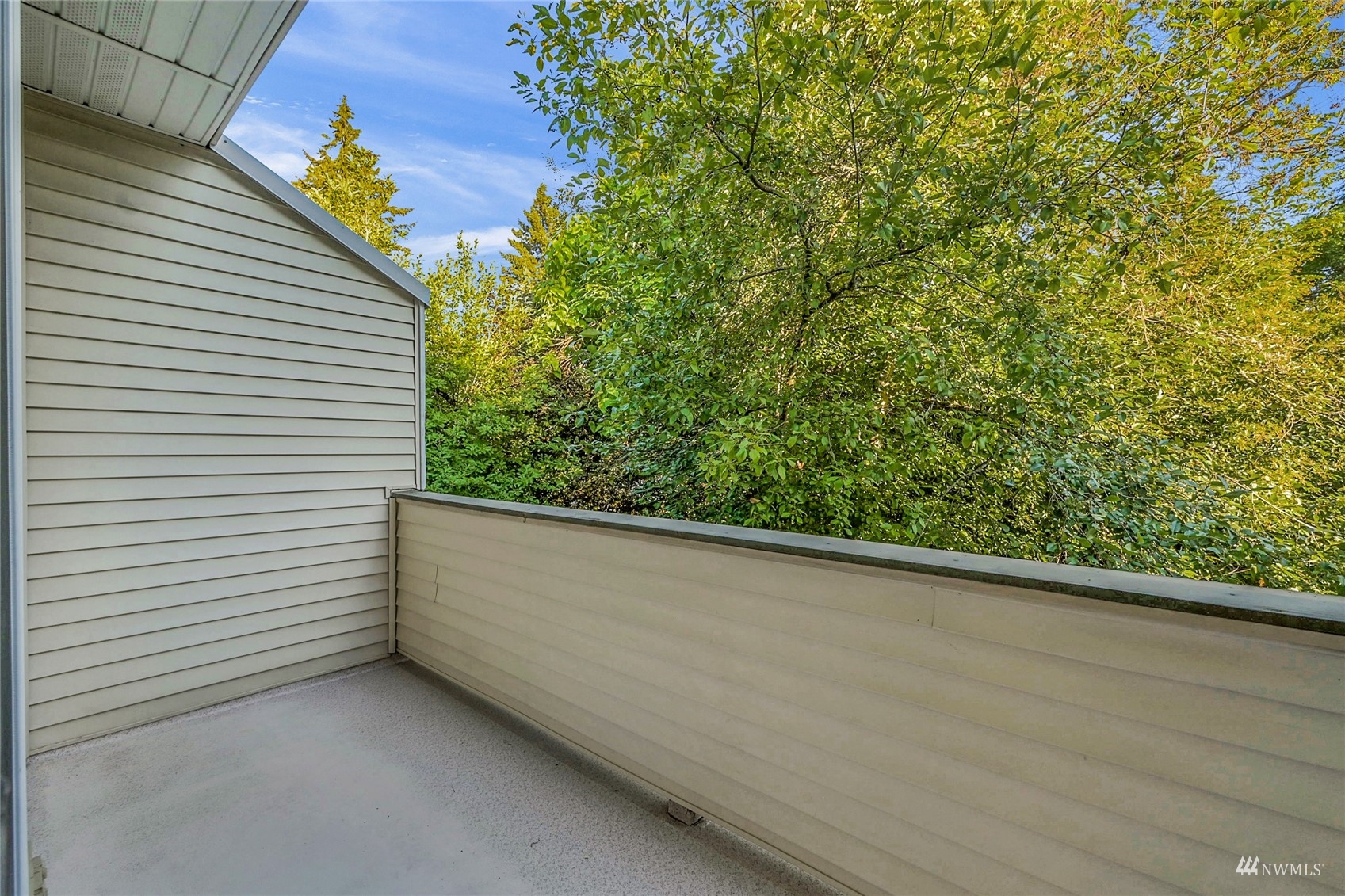 14335 Simonds Road Northeast, Unit A302 Kirkland, WA 98034 - Photo 25 of 25 a view of a balcony with an outdoor space