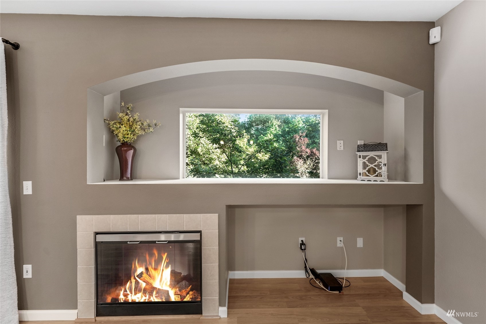 14335 Simonds Road Northeast, Unit A302 Kirkland, WA 98034 - Photo 5 of 25 a view of living room with furniture and a fireplace