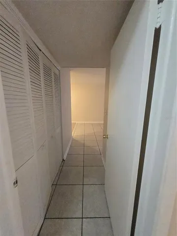 a view of hallway with stairs