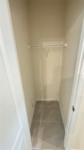 a bathroom with a glass door shower