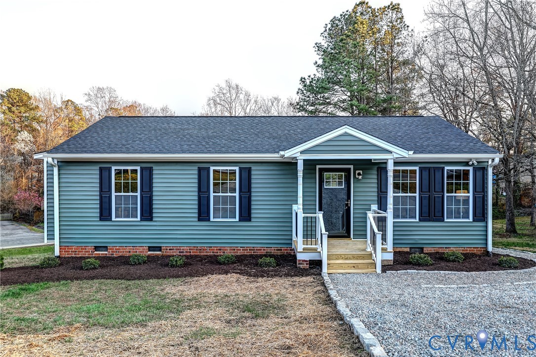 12301 Beaver Point Drive Midlothian, VA 23112 - Photo 1 of 24 a front view of a house with yard