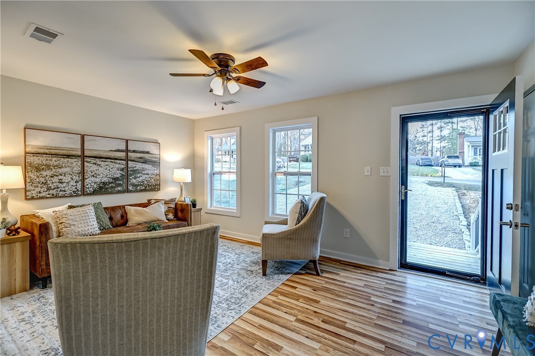 12301 Beaver Point Drive Midlothian, VA 23112 - Photo 7 of 24 a living room with furniture and a large window