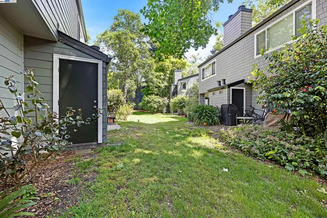a view of a glass door and the balcony