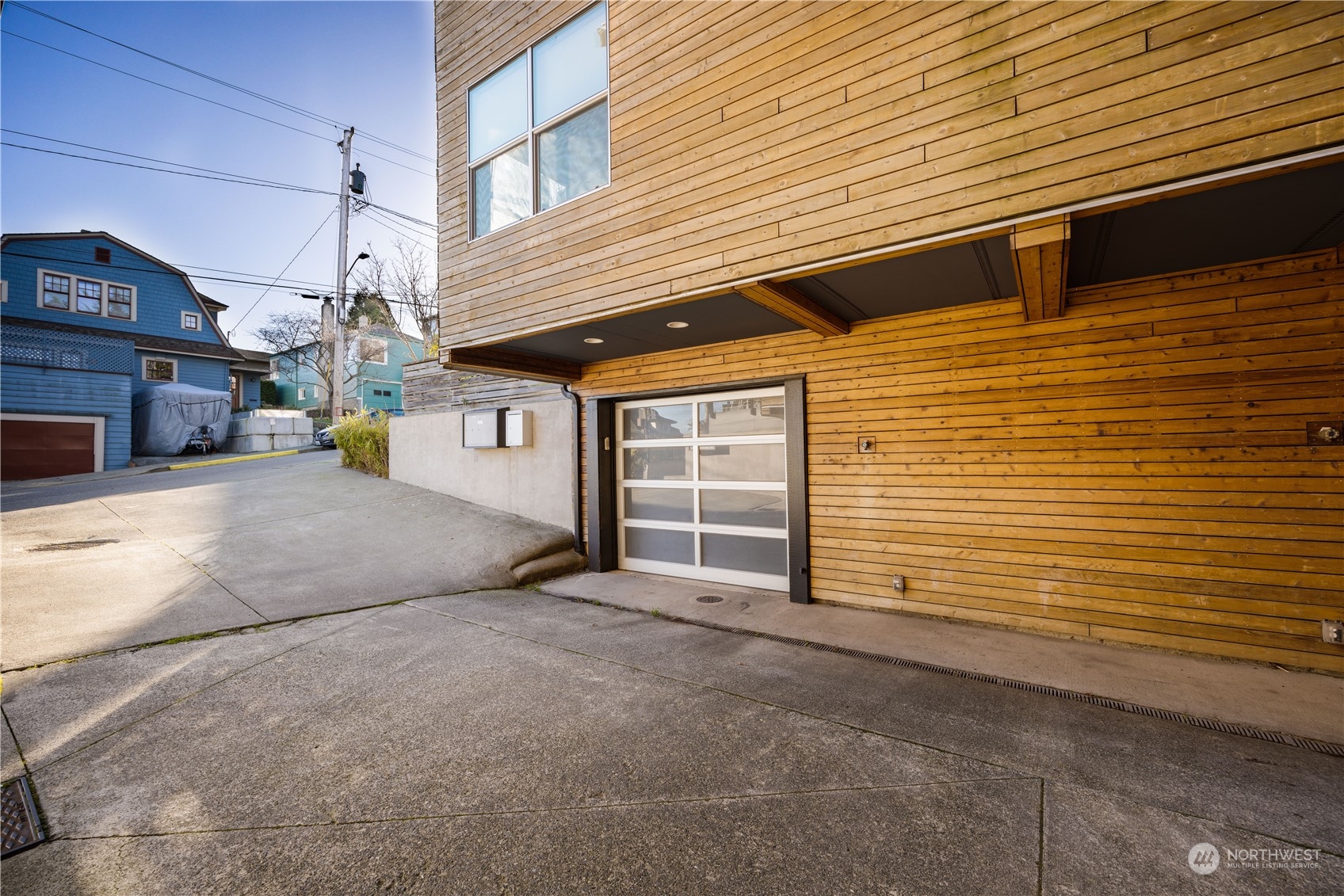 562 Galer Street, Unit A Seattle, WA 98109 - Photo 28 of 30 a view of a house with a street