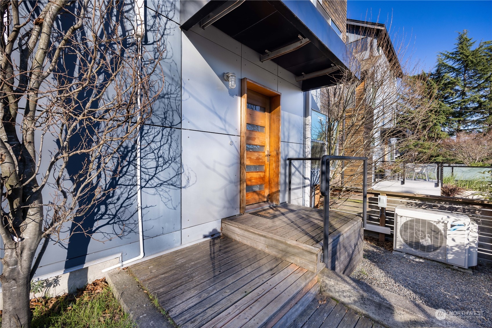 562 Galer Street, Unit A Seattle, WA 98109 - Photo 29 of 30 a view of a chairs and table on the wooden floor
