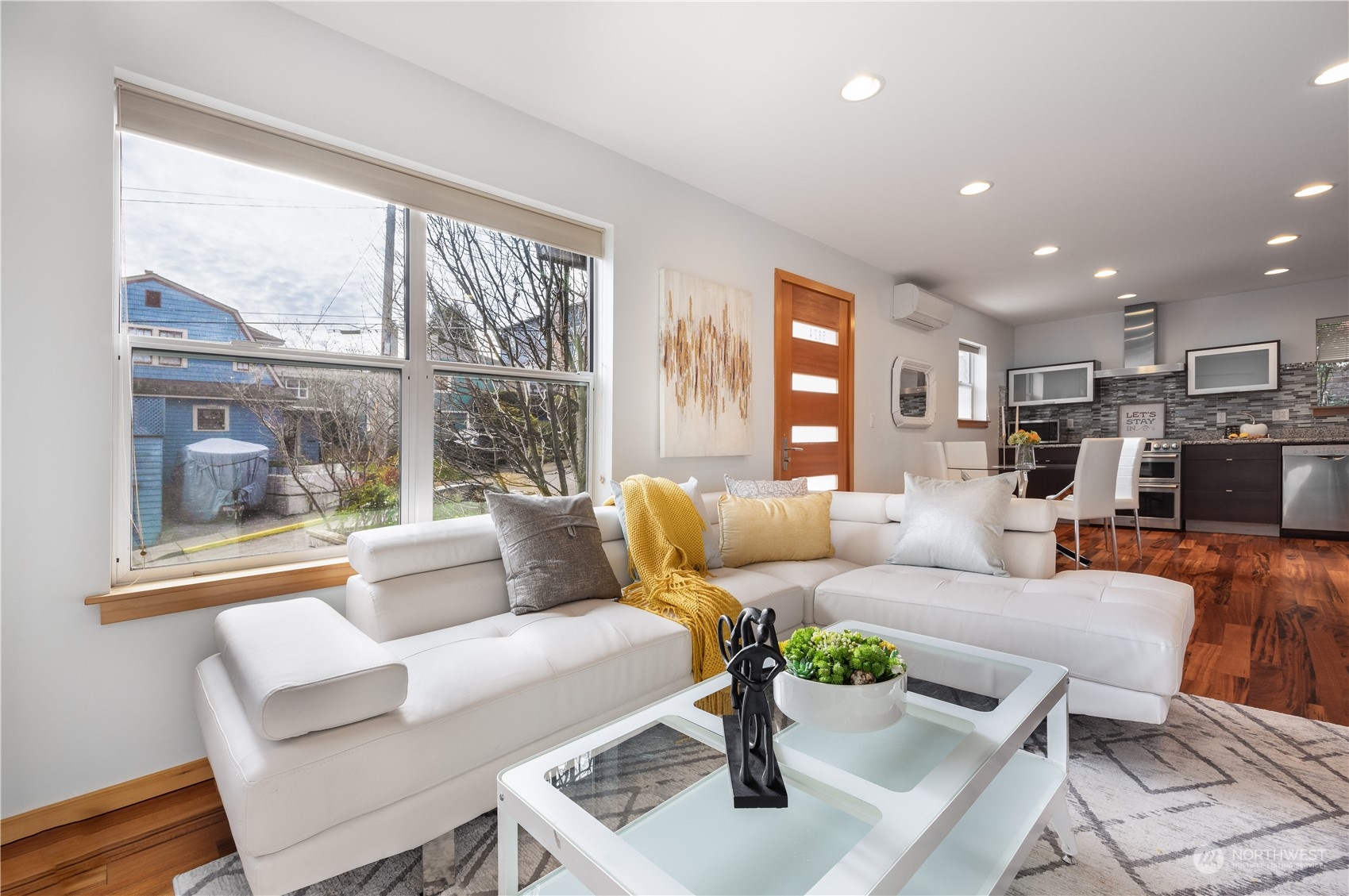 562 Galer Street, Unit A Seattle, WA 98109 - Photo 4 of 30 a living room with furniture and a large window