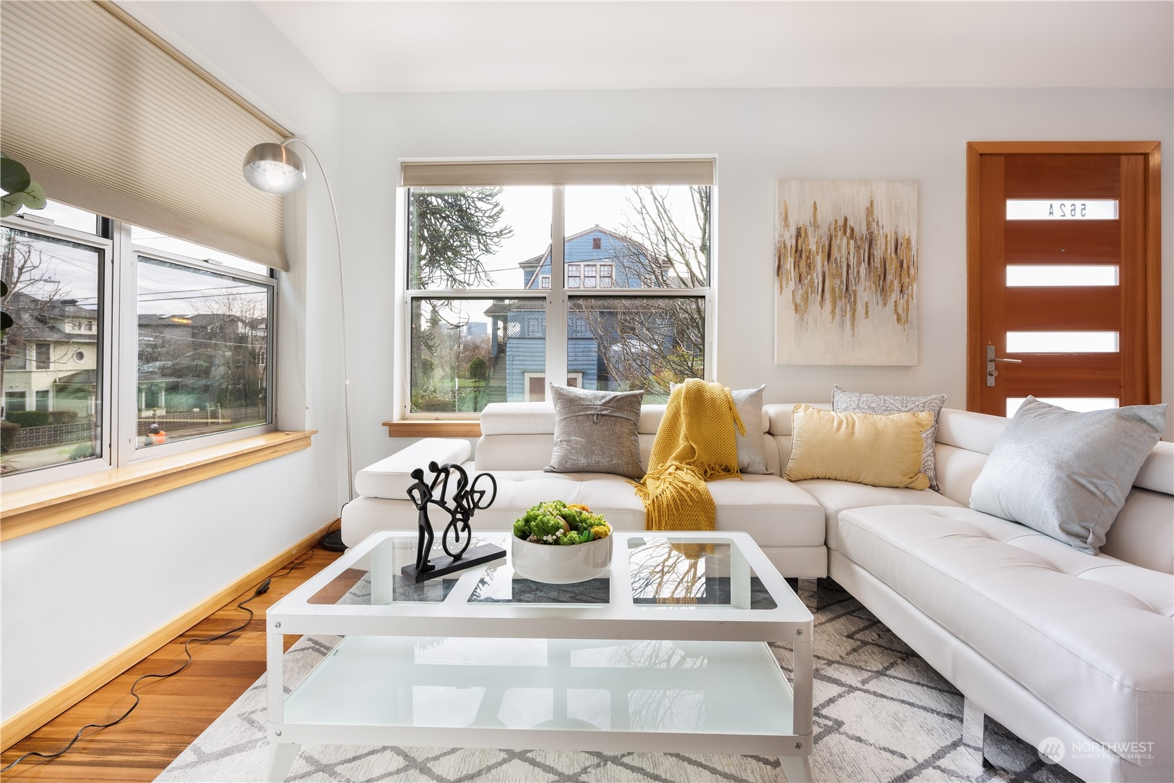 562 Galer Street, Unit A Seattle, WA 98109 - Photo 5 of 30 a living room with furniture and a large window