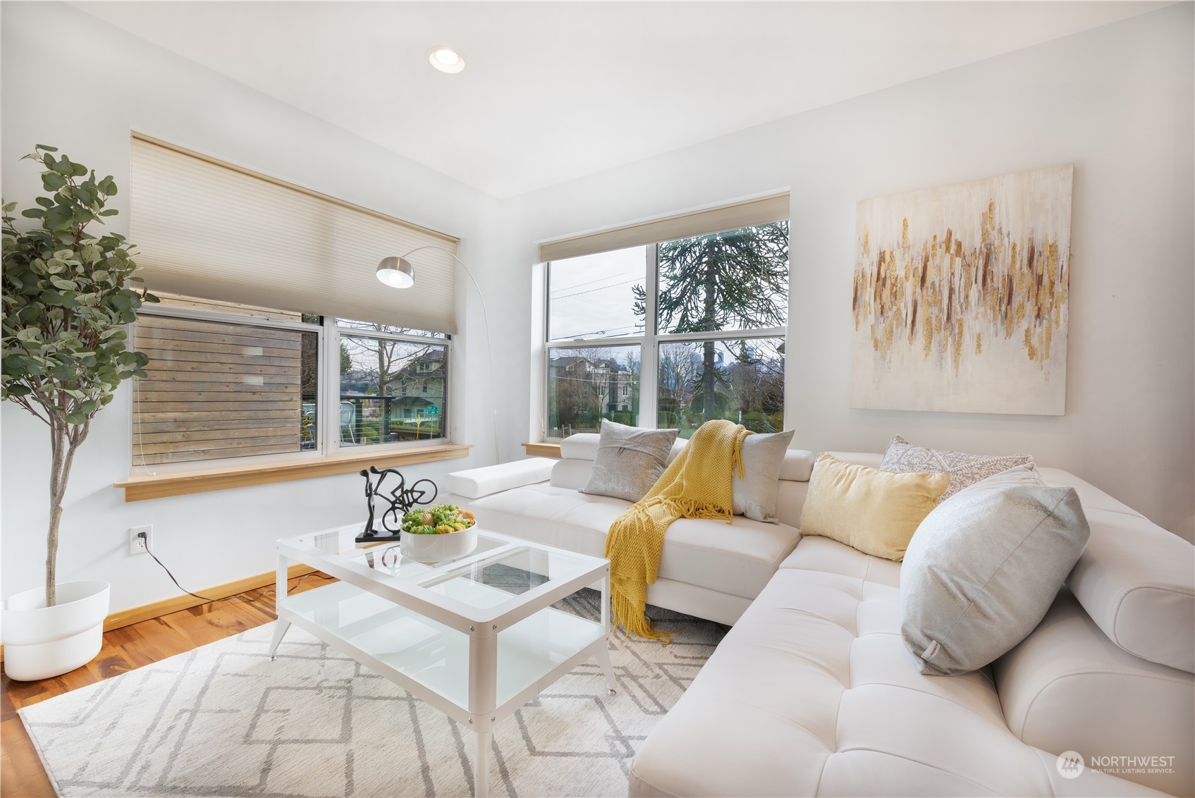 562 Galer Street, Unit A Seattle, WA 98109 - Photo 6 of 30 a living room with furniture and a large window