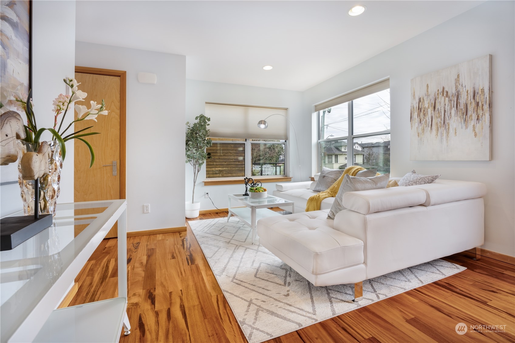 562 Galer Street, Unit A Seattle, WA 98109 - Photo 7 of 30 a living room with furniture and a large window