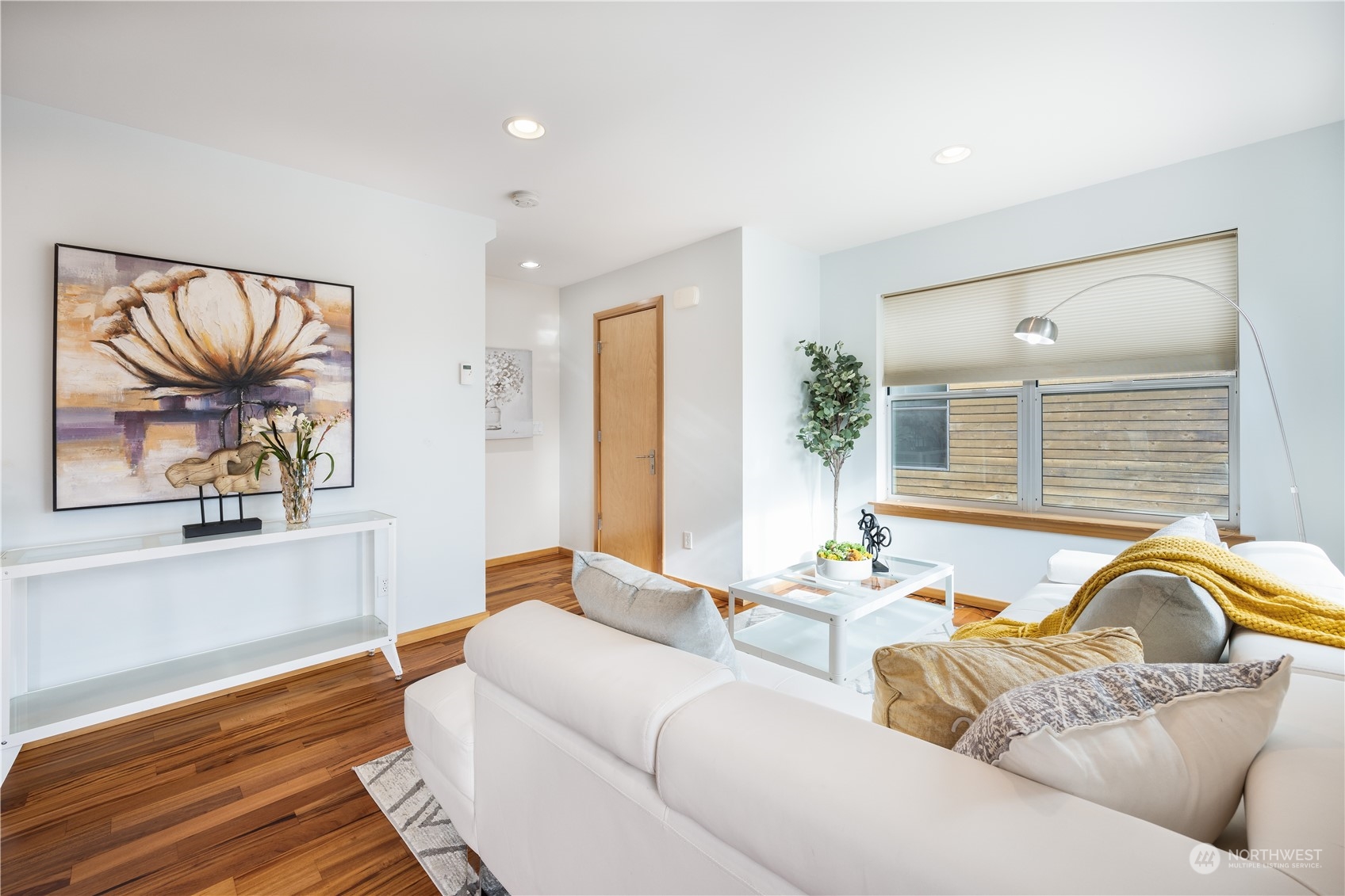 562 Galer Street, Unit A Seattle, WA 98109 - Photo 8 of 30 a living room with furniture and a large window