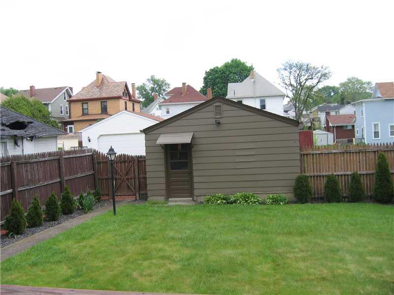 411 Vermont Avenue Rochester, PA 15074 - Photo 15 of 16 Parking Lot/Garage. The detached garage offers space enough for a can as well as storage. In addition there is off street parking in the rear.