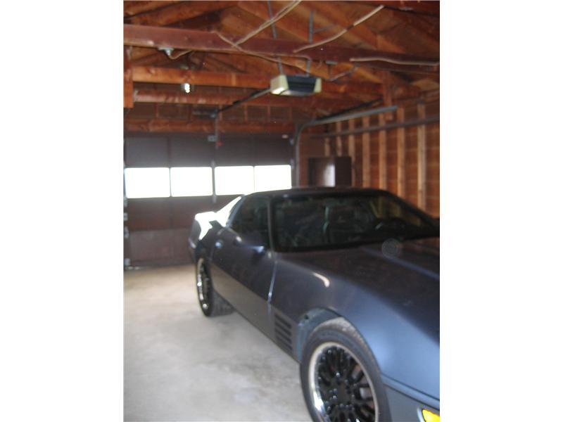 411 Vermont Avenue Rochester, PA 15074 - Photo 16 of 16 Parking Lot/Garage. The Vette does not come with the house, however notice how clean and spotless the garage remains.