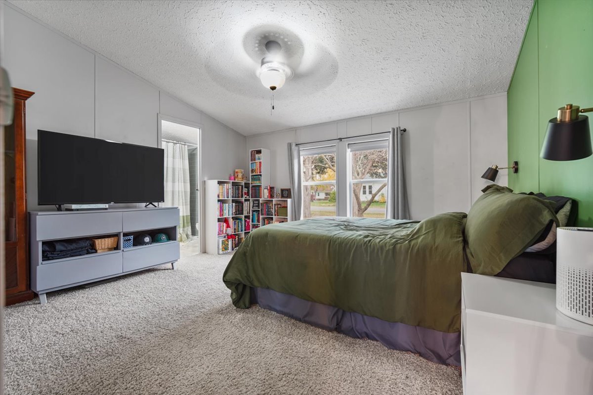 602 West 6th Street Minonk, IL 61760 - Photo 14 of 32 a living room with furniture and a flat screen tv