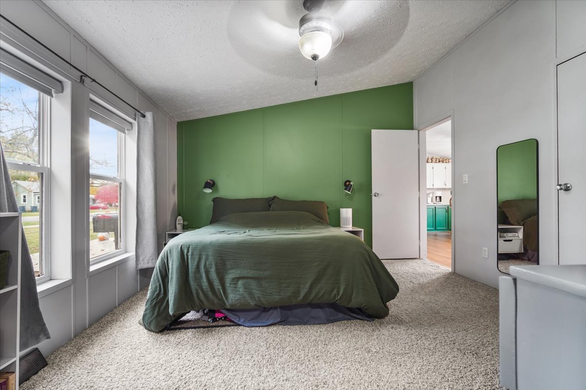 602 West 6th Street Minonk, IL 61760 - Photo 15 of 32 a bedroom with a bed and a window
