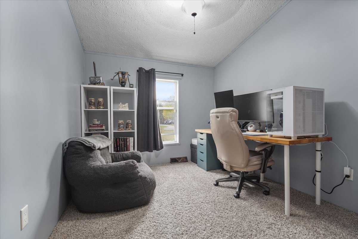 602 West 6th Street Minonk, IL 61760 - Photo 19 of 32 a workspace with furniture and a window