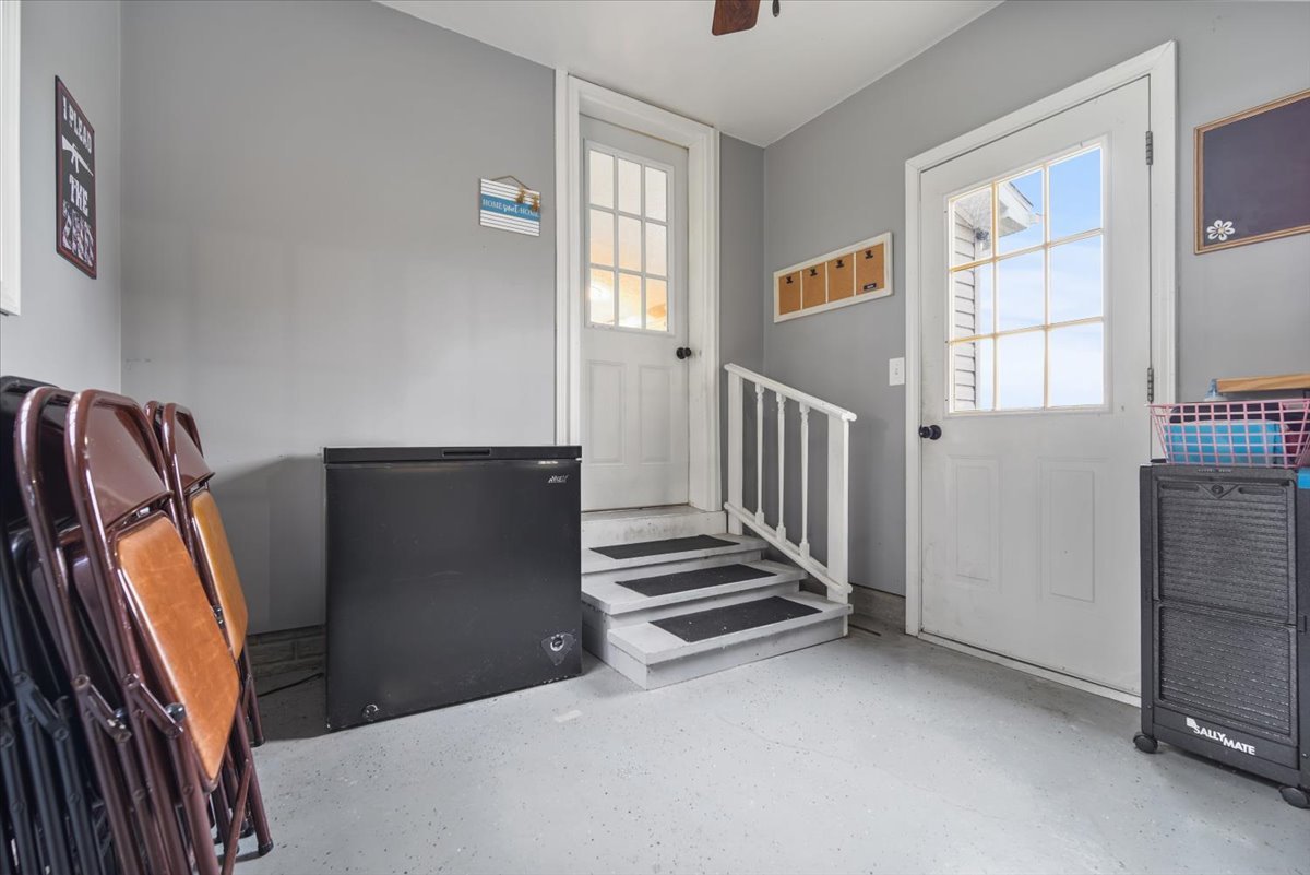 602 West 6th Street Minonk, IL 61760 - Photo 22 of 32 a view of a livingroom with a staircase
