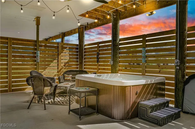a view of balcony with chairs