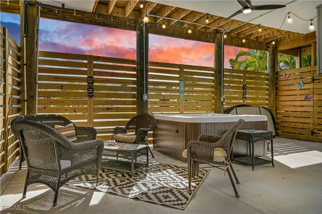 a table and chairs sitting in front of a building