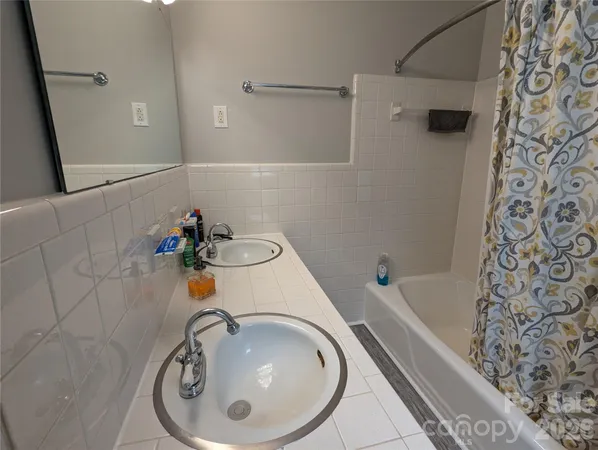 a bathroom with a sink and a tub