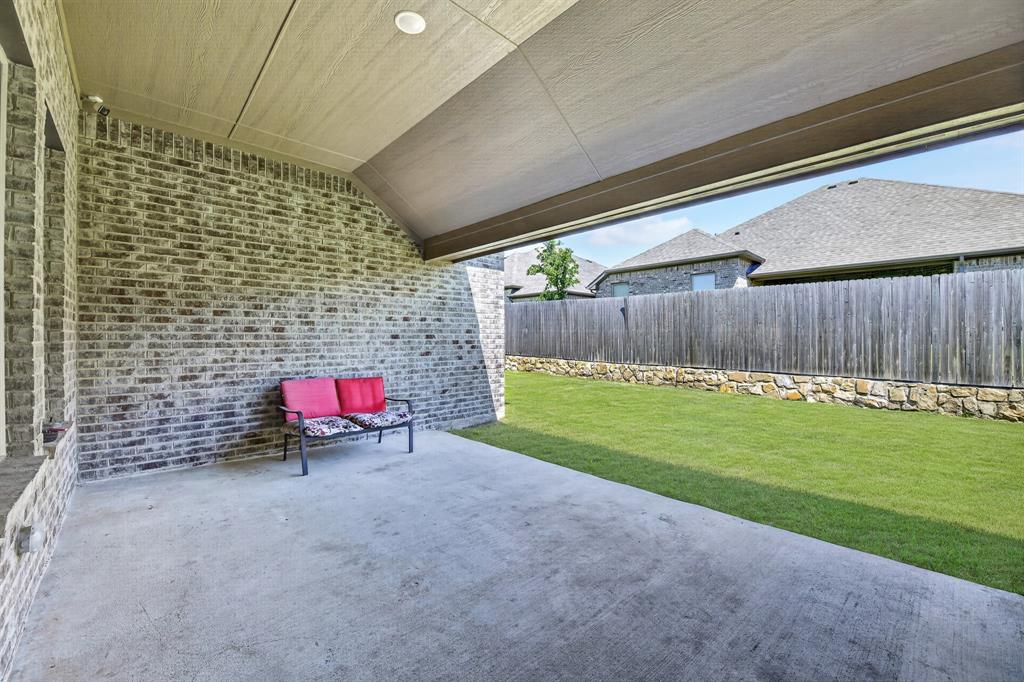 136 Gleeson Drive Red Oak, TX 75154 - Photo 37 of 40 a view of a backyard with a sitting area