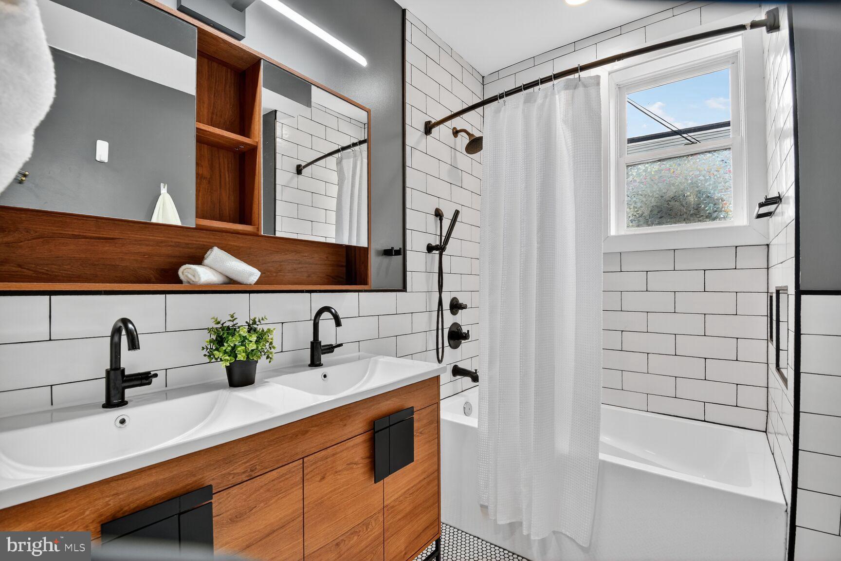 1027 6th Street Northeast Washington, DC 20002 - Photo 12 of 38 Sleek modern bathroom on second level.