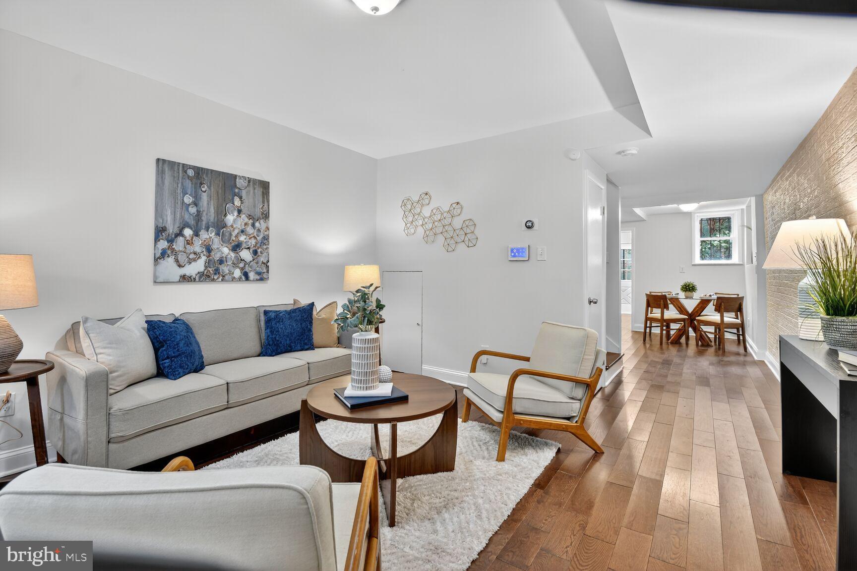 1027 6th Street Northeast Washington, DC 20002 - Photo 3 of 38 Bright and inviting living space with warmth.