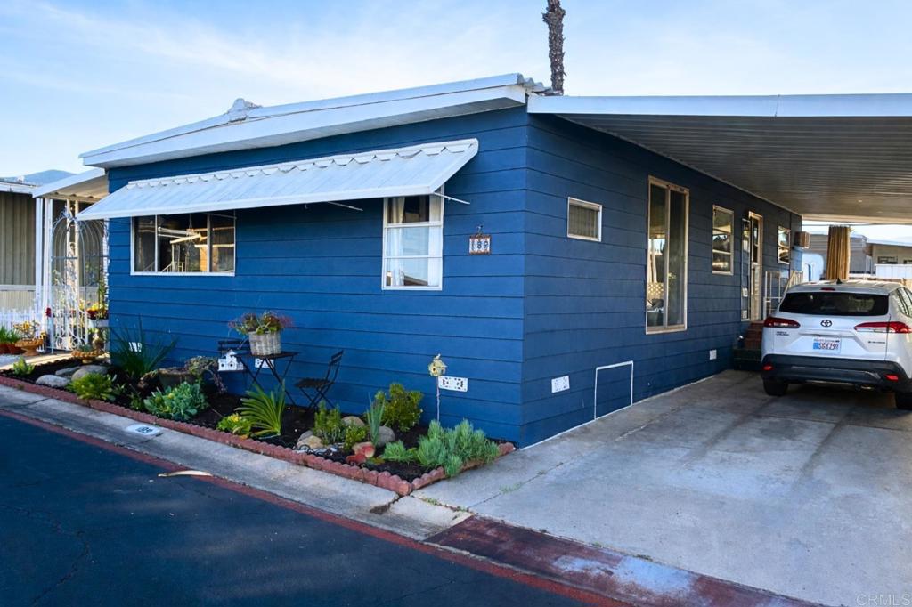 Exterior Front with Carport