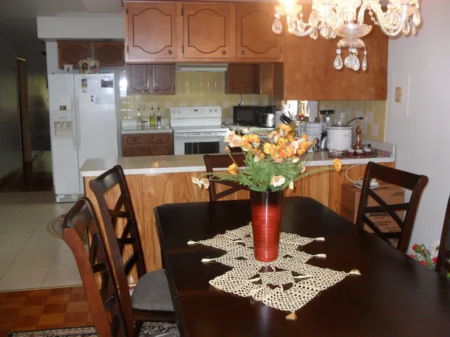 a vase of flowers sitting on a table